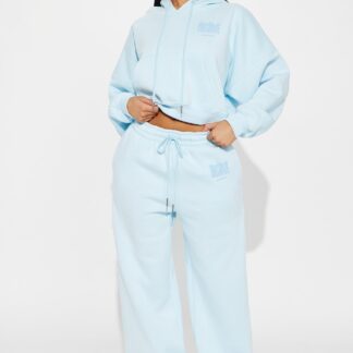 Conjunto de Pantalón y Buzo de Frisa en Celeste Claro